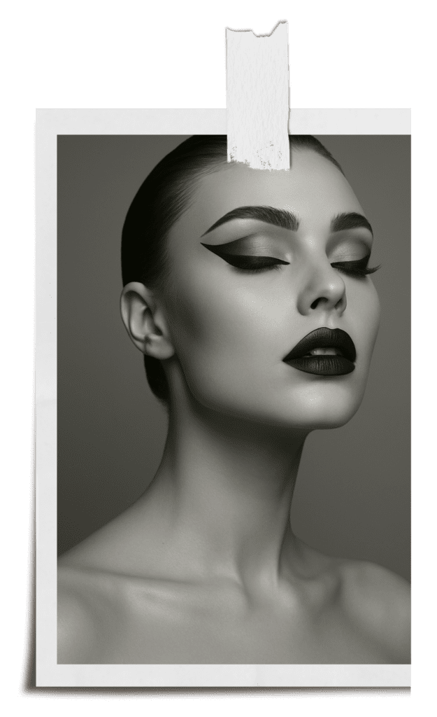 Black and white editorial beauty portrait showcasing sculpted features, sharp eyeliner, and refined aesthetic precision.